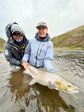 Angler and Guide with an Icelandic fish